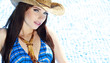 closeup fashion portrait of sexy girl standing in swimming pool