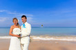 Photo: young couple get married on the beach young couple get married on the beach