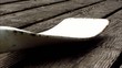 Rowing blade laying on a jetty