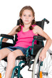 Photo: Young handicapped girl in a wheelchair over white background. Young handicapped girl in a wheelchair over white background.