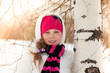 Cute girl in birch forest