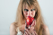portrait of a woman with an apple