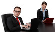 Foto: Young Business Couple on Laptops Young Business Couple on Laptops