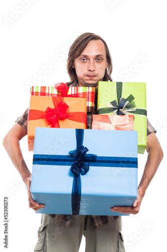 Photo: Man carrying many gifts Man carrying many gifts