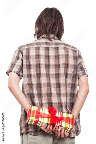 Photo: Rear view of man with small present Rear view of man with small present