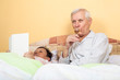 Foto: Drunk senior in bed Drunk senior in bed