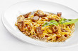 Tasty food. Pasta with roasted meat.