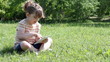 little girl play video game on tablet pc