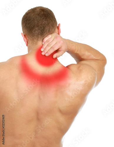 Photo: Muscular man with back neck ache, isolated on white background Muscular man with back neck ache, isolated on white background