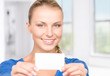 happy woman with business card