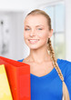 young attractive businesswoman with folders