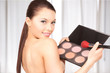 Photo: lovely woman with palette and brush lovely woman with palette and brush