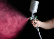 Spray gun in hand