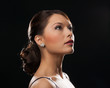 woman with diamond earrings