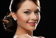 woman with diamond earrings