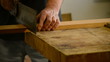 Luthier, carpenter, craftsman, cuts wood for guitar mastil's