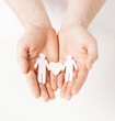 man hands with paper men