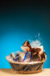 gift in a basket against blue background