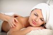 Closeup of an attractive young woman receiving massage