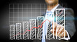 Businessman touching graphic