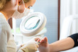 Woman in poidatry studio receiving pedicure
