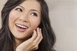 Beautiful Asian Chinese Woman Talking on Cell Phone