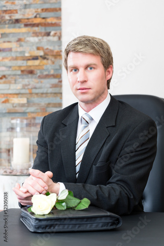 Photo: Mortician in his store Mortician in his store