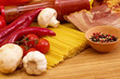 Italian raw pasta, cherry tomatoes, garlic, sauce and spices