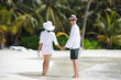 Photo: happy young couple have fun on beach happy young couple have fun on beach