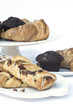 Continental breakfast table setting with pastries and cakes