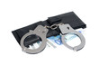 Foto: Black leather wallet with handcuffs, clipping path included. Black leather wallet with handcuffs, clipping path included.