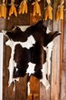 Cattle black and white skin texture on wooden background