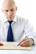 Photo: Business man is working at the desk Business man is working at the desk