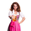 attraktive junge Frau im Dirndl mit Bierkrug