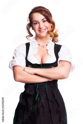 Photo: attraktive junge Frau im Dirndl mit verschränkten Armen attraktive junge Frau im Dirndl mit verschränkten Armen
