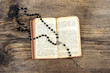 the Bible and a rosary