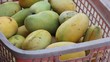 take mango out of the basket