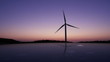 windmill in twiglight with reflection