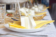 Wedding table cutlery and gift box on plate background concept
