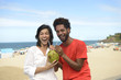 Photo: Multiracial couple coconut water Rio de Janeiro, Brasil Multiracial couple coconut water Rio de Janeiro, Brasil