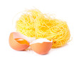 Several eggs and pasta on a white