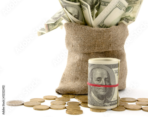 Photo: Canvas money sack with one hundred dollar bills Canvas money sack with one hundred dollar bills