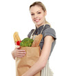 Portrait of  young female holding a shopping bag of groceries