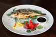 Photo: Grilled fish with tomato, herbs, onions and lemon Grilled fish with tomato, herbs, onions and lemon