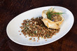 Photo: Buckwheat porridge with vegetables, served with sauce. Buckwheat porridge with vegetables, served with sauce.
