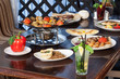 Beautifully set table with a different meal