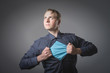 Businessman showing a superhero suit underneath his suit