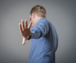 Businessman showing stop hand sign