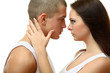 Foto: Young beautiful loving couple is embracing - on white background Young beautiful loving couple is embracing - on white background
