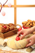 Hands kneading the Easter bread dough